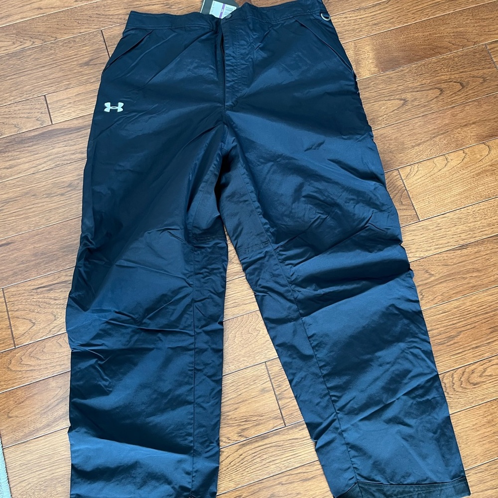 Men’s  under Armour XXL pants. New with tags. Snaps around ankle